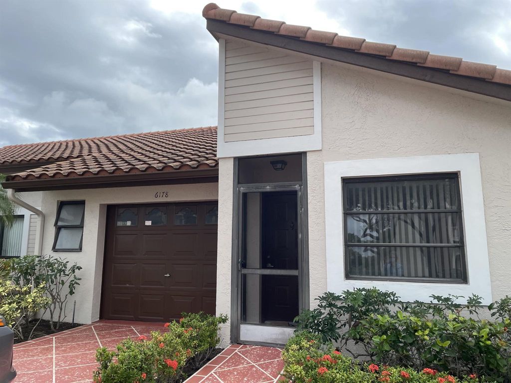 Photo of 6178 Pointe Regal Circle, Delray Beach, FL 33484 (MLS # R10937251)