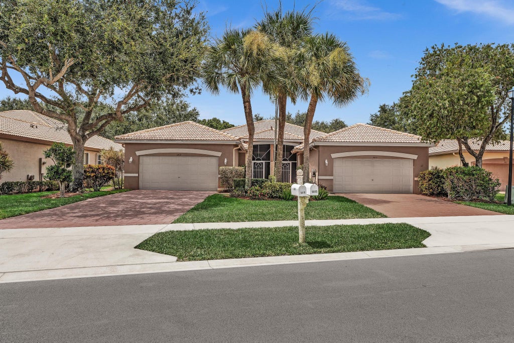 Photo of 5819 GRAND HARBOUR Circle, Boynton Beach, FL 33437 (MLS # B26059730)