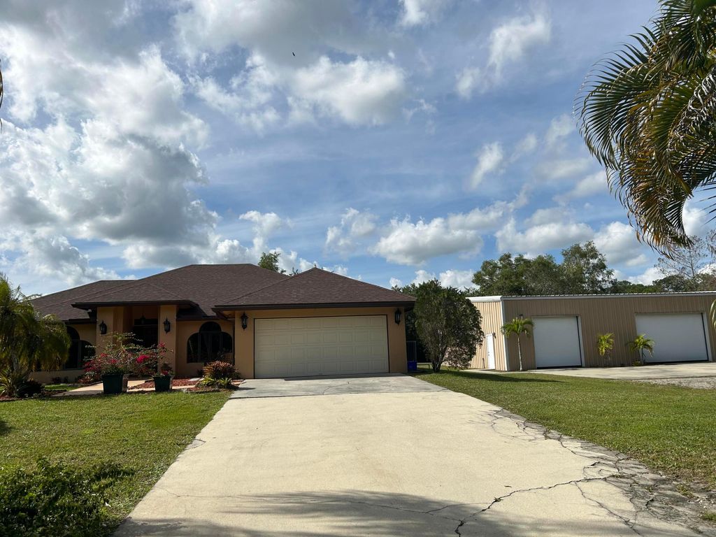 Photo of 15687 80th Drive N, Palm Beach Gardens, FL 33418 (MLS # R10955659)