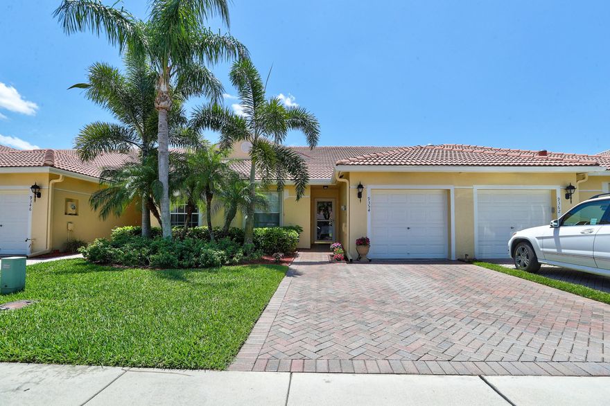 This spectacular 2 bedrooms plus den, 2 bath, one car garage villa with gorgeous lake view is located in desirable active-adult community of Baywinds. Home features: open floor plan with 2 separated bedrooms and bath on both sides, den with French door, vaulted ceilings, tiled floors in living area, 42'' wood cabinets, Corian countertop, custom tiled back-splash in oversized kitchen, screened patio overlooking lake, accordion shutters, newer A/C. Home has plenty of natural light, it is freshly painted and super clean. This community offers a fully staffed clubhouse, 3 swimming pools, 6 tennis courts, fitness center, 4 shuffleboard and 4 bocce courts, aerobic and billiard room and a versatile ballroom with a stage for entertainment.