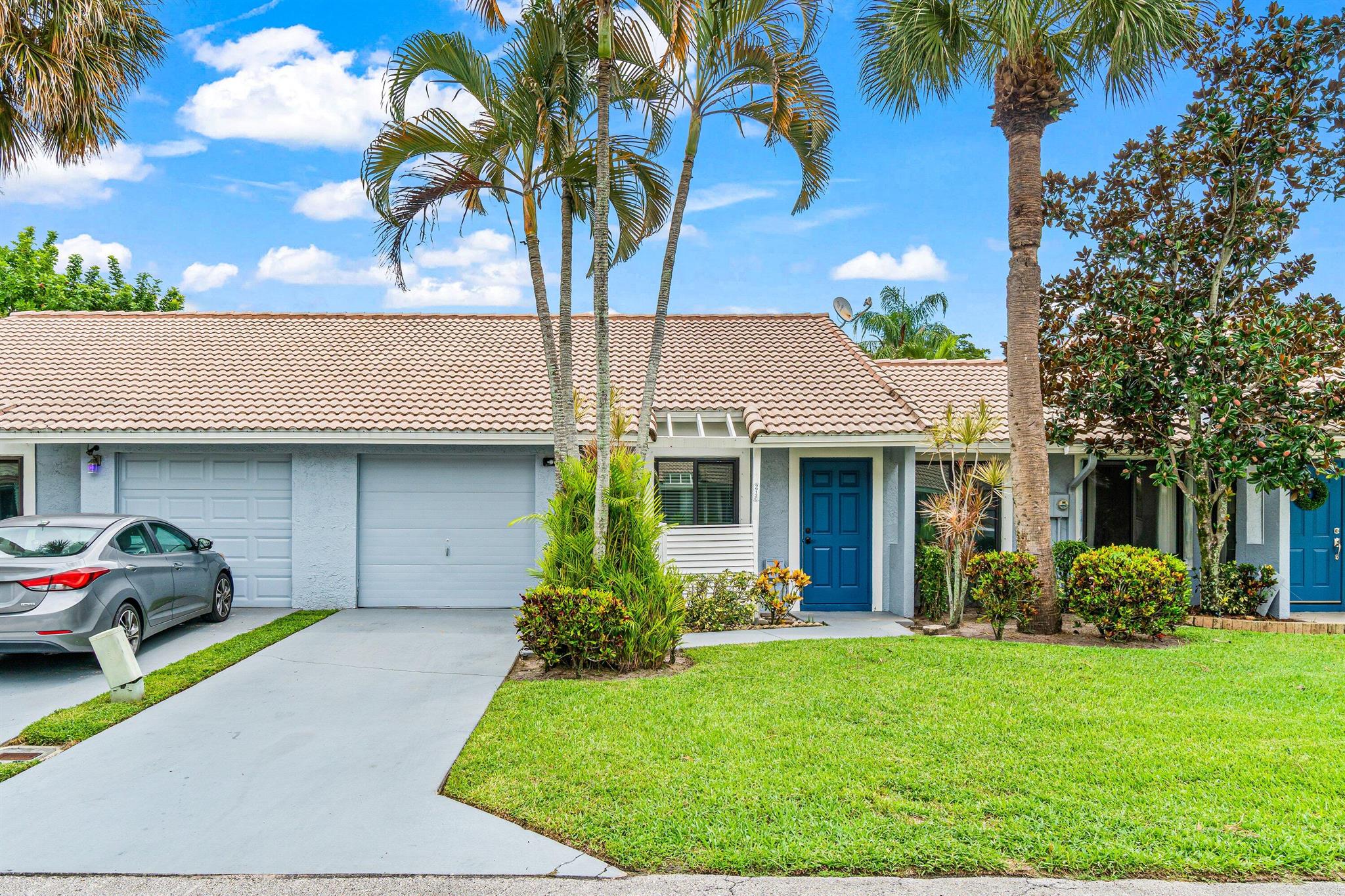 Welcome to 9913 Watermill Circle C, a spacious and well-maintained 2-bedroom, 2-bathroom villa with a 1-car garage, located in the highly sought-after community of Country Fair. This residence combines comfort, style, and convenience, offering the perfect opportunity for your next home.From the moment you arrive, you'll appreciate the private walk-up entry that leads into a bright, open living space. The home boasts tile flooring throughout, providing both durability and easy maintenance. The entire unit has been freshly painted in neutral Sherwin Williams tones, creating a warm and modern feel that's move-in ready.The eat-in kitchen provides plenty of room for casual dining, while the impact windows and sliding glass doors allow natural light to flow in