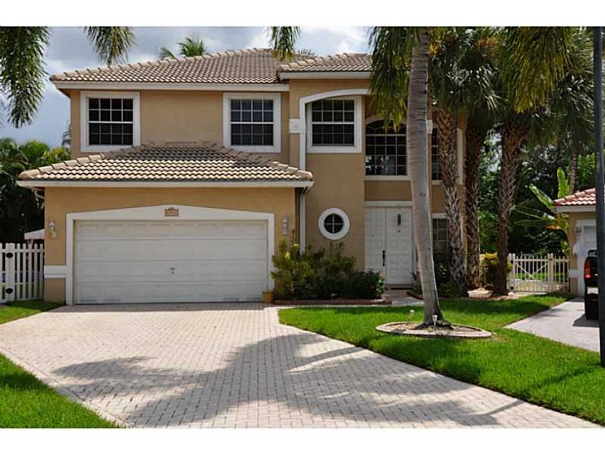 Paradise found! 3 bedrooms plus large office/ 4th bedroom with tropical paradise pool area. Private large back yard has lots of fruit trees and entertaining area. Home has lots of upgrades including granite counter tops, SS appliances , wood floors thruou t the home. Updated master bath. Custom woodwork in office/4th bdrm. Trane air conditioning system. two car garage plus large work area. New washer & dryer. Walk to shops & park & send the kids to the best Parkland schools.