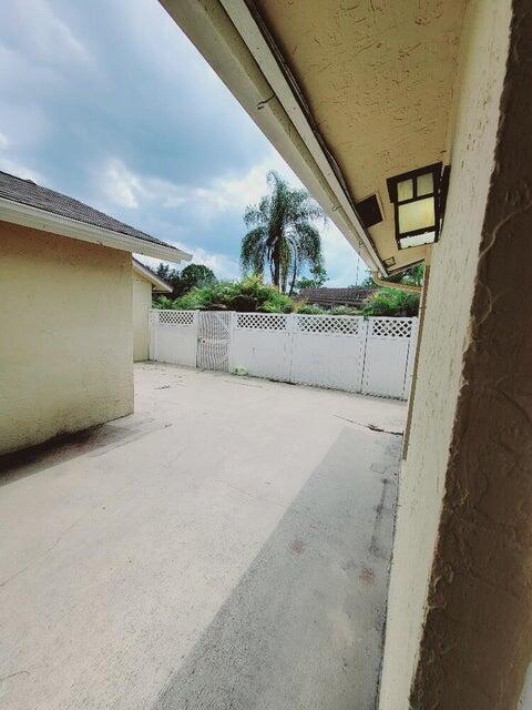 Large interior floor plan includes 3 bedrooms, 2 full baths, 1 car garage, fenced in courtyard patio. Feels more like a single-family home.