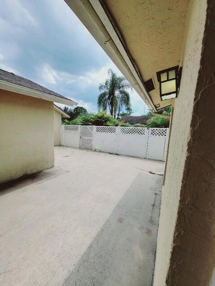 Large interior floor plan includes 3 bedrooms, 2 full baths, 1 car garage, fenced in courtyard patio. Feels more like a single-family home.