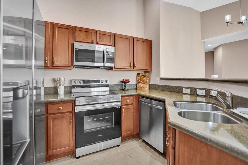Photo of 1825 Sonrisa Street #1825, Riviera Beach, FL 33404 (MLS # B26022593)