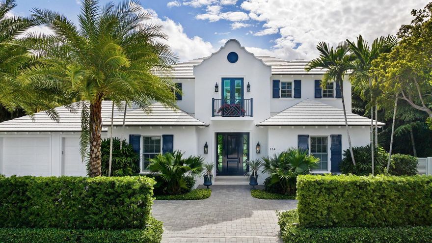 Elevate your lifestyle in this ''nearly new'' four bedroom home with first floor primary suite nestled in the heart of town, ideally situated on a sought-after ocean block. This classic Bermuda style home exudes sophistication with its high end finishes, including wide plank white oak floors, marble mosaics, and custom cabinetry/moldings throughout. The southern exposure bathes the home in natural light, highlighting the exquisite craftsmanship. Other features include fireplace, Savant system, hurricane impact windows, generator, and tankless hot water heaters. Enjoy the tranquility of this prime location offering deeded beach access, Lake Trail access, and close proximity to nearby shops and restaurants. A must see!