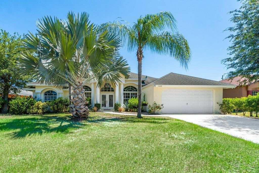 Photo of 1426 SW San Esteban Avenue, Port Saint Lucie, FL 34953 (MLS # R10991124)