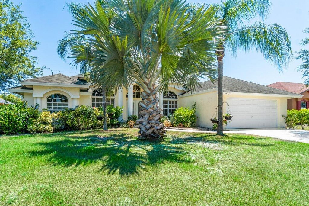 Photo of 1426 SW San Esteban Avenue, Port Saint Lucie, FL 34953 (MLS # R10991124)
