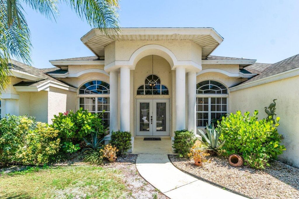 Photo of 1426 SW San Esteban Avenue, Port Saint Lucie, FL 34953 (MLS # R10991124)