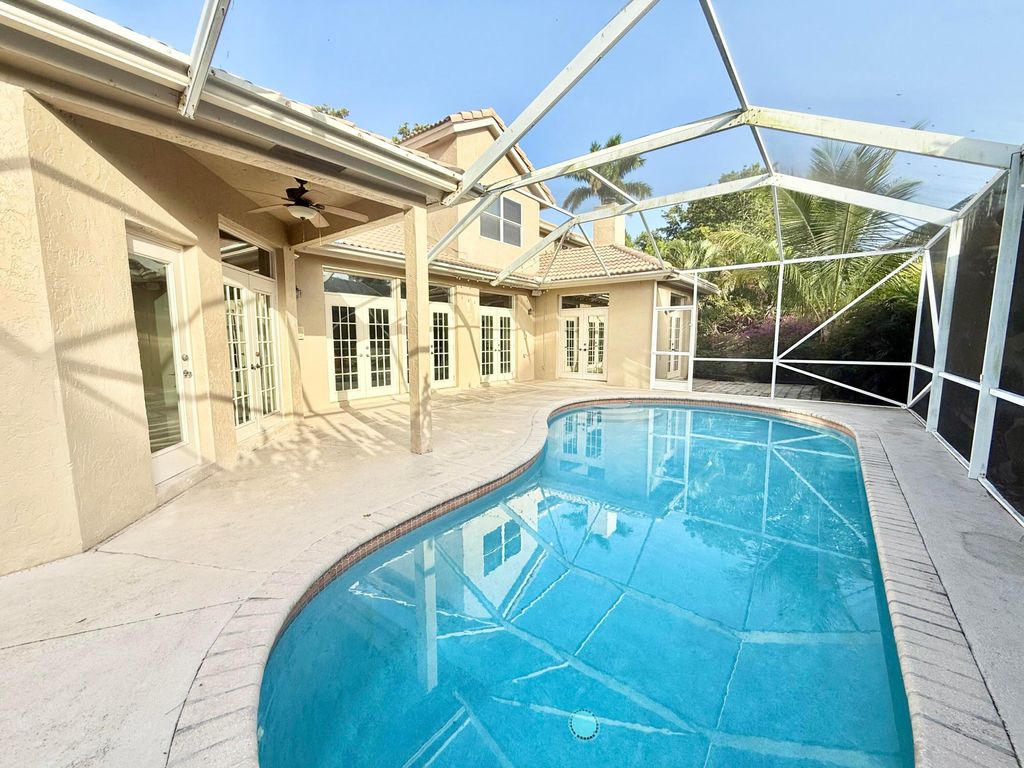 Photo of 10921 Haydn Drive, Boca Raton, FL 33498 (MLS # R11097645)