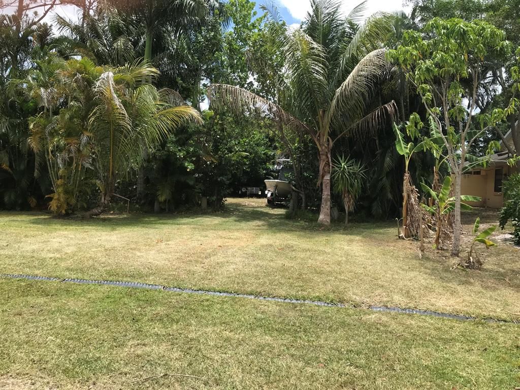 Photo of 850 SE Streamlet Avenue, Port Saint Lucie, FL 34983 (MLS # R10718621)