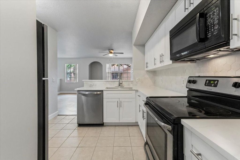 Photo of 2301 Belmont Lane, North Lauderdale, FL 33068 (MLS # B26006055)