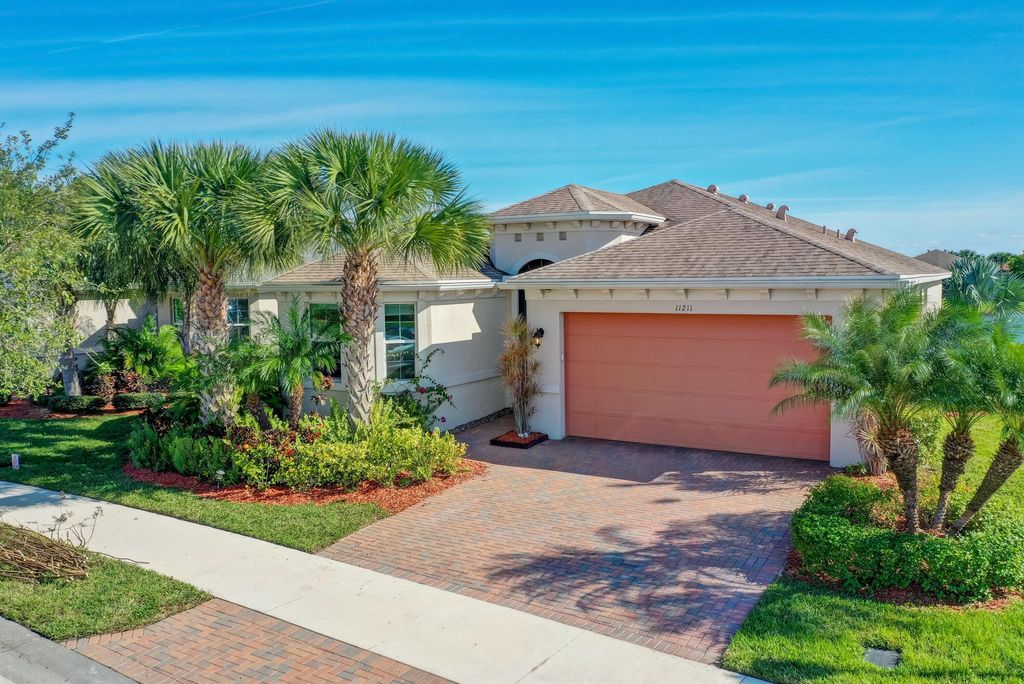 Photo of 11211 SW Lake Park Drive, Port Saint Lucie, FL 34987 (MLS # R11006141)