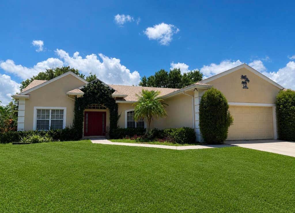 Photo of 610 SW COLLEGE PARK Road, Port Saint Lucie, FL 34953 (MLS # B26062747)
