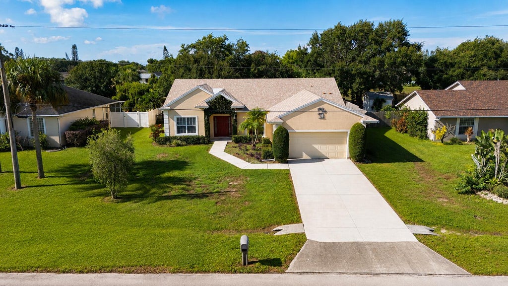 Photo of 610 SW COLLEGE PARK Road, Port Saint Lucie, FL 34953 (MLS # B26062747)