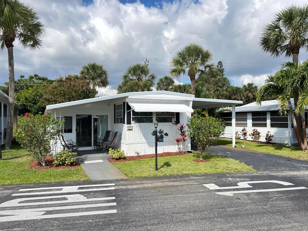 Photo of 615 Alamanda Lane, Deerfield Beach, FL 33442 (MLS # B26007351)