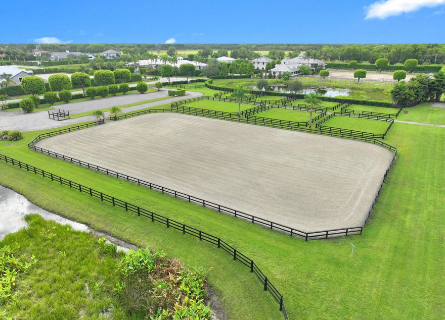 Rare 4.38 acre parcel located within the prestigious gated community of Grand Prix Village South. This stunning property is beautifully landscaped and features a state-of-the-art all weather arena, 8 lush grass paddocks and grooming/ wash stalls. 3899 Shutterfly Way offers the ideal canvas to build your dream equestrian stable in an elite location. Westerly views and easy access to both WEF show grounds and the scenic trails of Palm Beah Point make this a very special opportunity. Grand Prix Village South is known for its location with direct access to the horse show, impeccable grounds and proximity to top competition arenas. This is the ideal setting for the serious equestrian.
