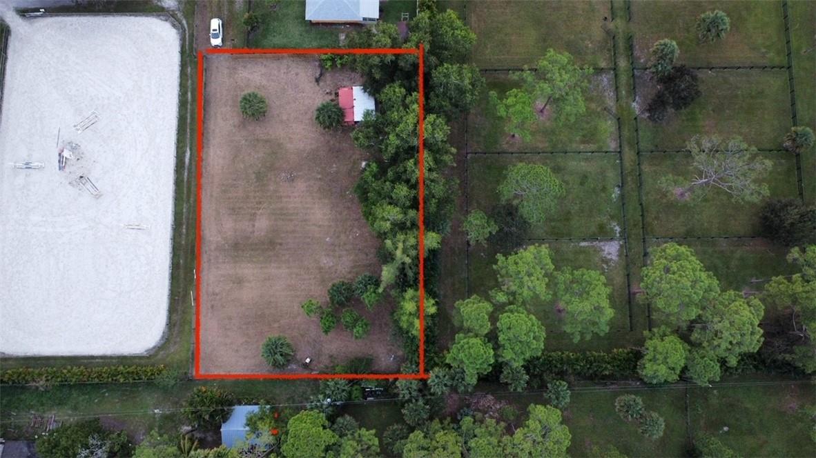 Lot of land with residential and agricultural zoning. Cleared, fenced, FPL meter installed. Corner lot at the end of quite road. Located in Loxahatchee Groves, minutes to Wellington and Royal Palm Beach plazas and all they have to offer. Bring your horses, build your dream home or nursery (zoning approved). Perfect location in highly developing area of Palm Beach County.