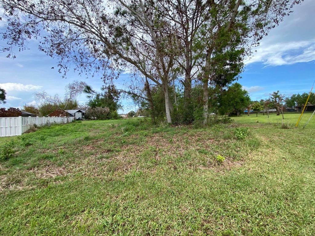Photo of 5859 NW Dunmore Avenue, Port Saint Lucie, FL 34986 (MLS # B26020526)