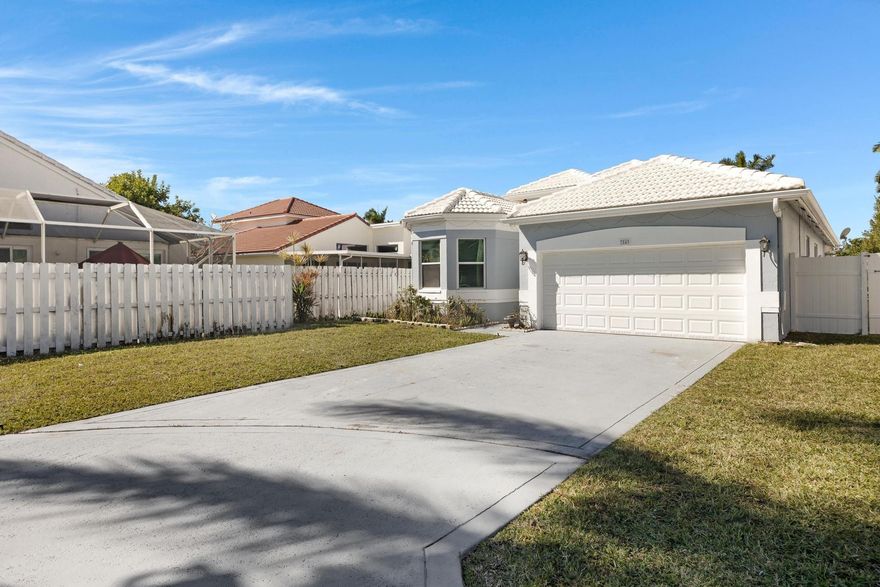 Beautiful one-story family home located in Lake Worth, West Palm Beach, offering the perfect blend of modern luxury and comfortable living. Featuring 4 bedrooms, 2.5 baths, and a 2-car garage, this move-in-ready home.  Open floor plan with neutral colors. Enjoy a stunning waterfront backyard with a beautiful pool, private patio access, and plenty of space to build your dream deck. Spacious primary suite designed for relaxation. Newer A/C, impact windows and doors provide peace of mind. Resort-style Lake Charleston amenities include tennis, pickleball, pool, sports fields, playgrounds, beach volleyball, fishing, and more. Walking distance to top-rated schools and minutes to dining, shopping, Turnpike, and I-95. Schedule showing today.  Seller offering $5000 closing costs assistance! Do not miss this opportunity . The house sell As Is. Very simple touch-up to make it your own.