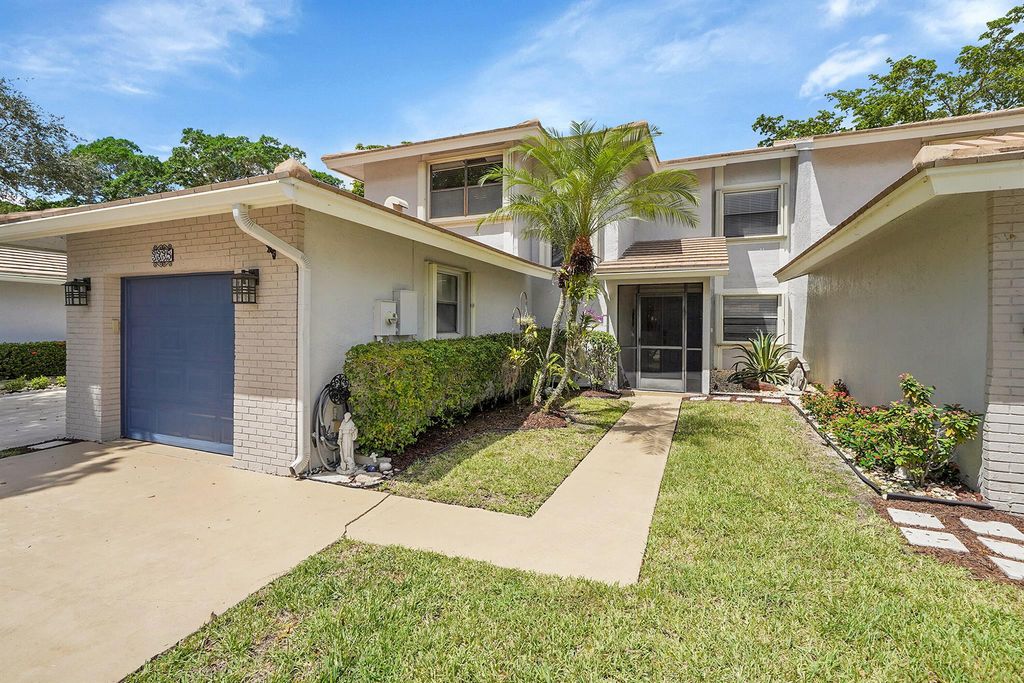 Photo of 3335 Deer Creek Lake Shore Drive, Deerfield Beach, FL 33442 (MLS # R11136040)