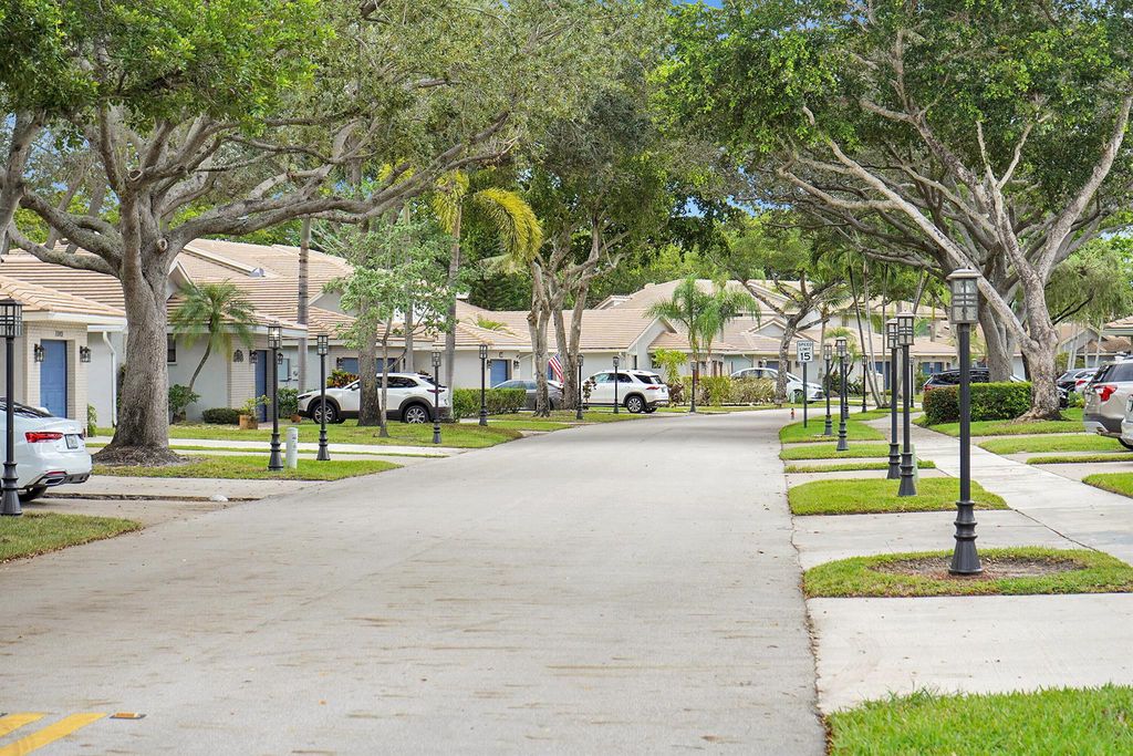 Photo of 3335 Deer Creek Lake Shore Drive, Deerfield Beach, FL 33442 (MLS # R11136040)