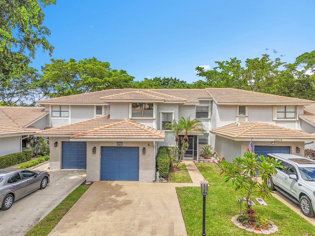 Photo of 3335 Deer Creek Lake Shore Drive, Deerfield Beach, FL 33442 (MLS # R11136040)