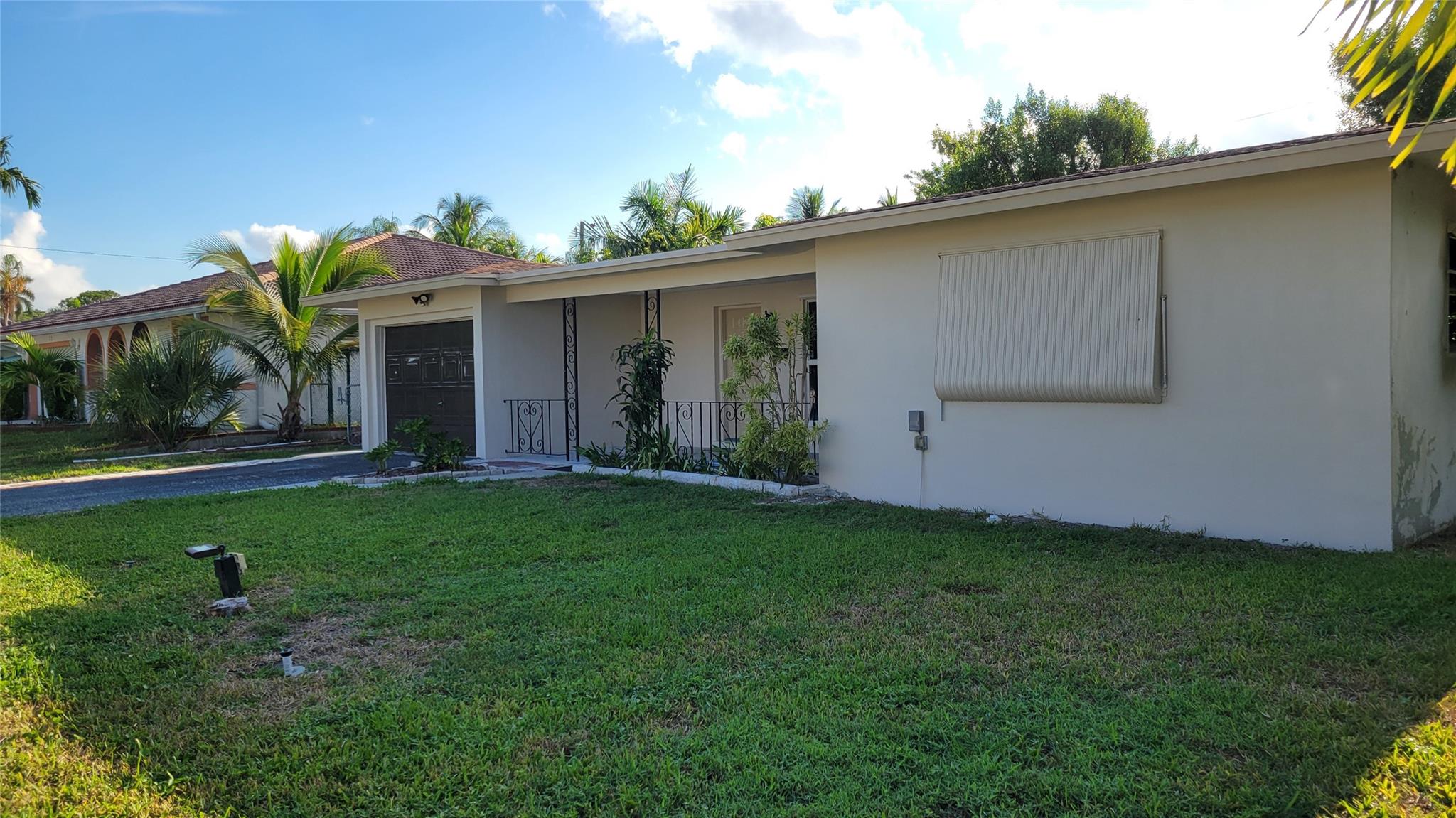 Wonderful East Deerfield Beach location. Just West of Federal Highway/South of Hillsboro Blvd. Close to everything from shopping, the beach, major highways, restaurants public parks, schools, and so much more. New kitchen with granite counters, inside laundry/utility room, 1 car garage, screened patio, large fenced in yard (room for pool and more), tile/terrazzo throughout, new electric panel, freshly painted inside and out. This home is the perfect home for any phase of life. Professional photos coming soon!