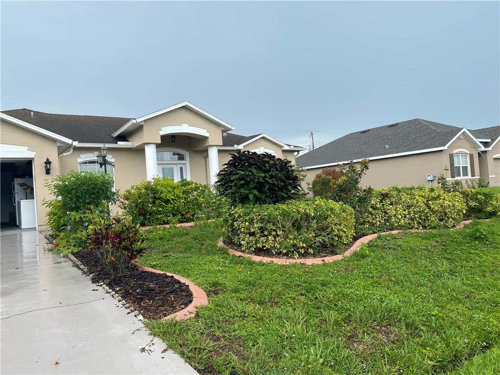 Photo of 1709 SW Finch Ln, Port Saint Lucie, FL 34953 (MLS # F10291490)