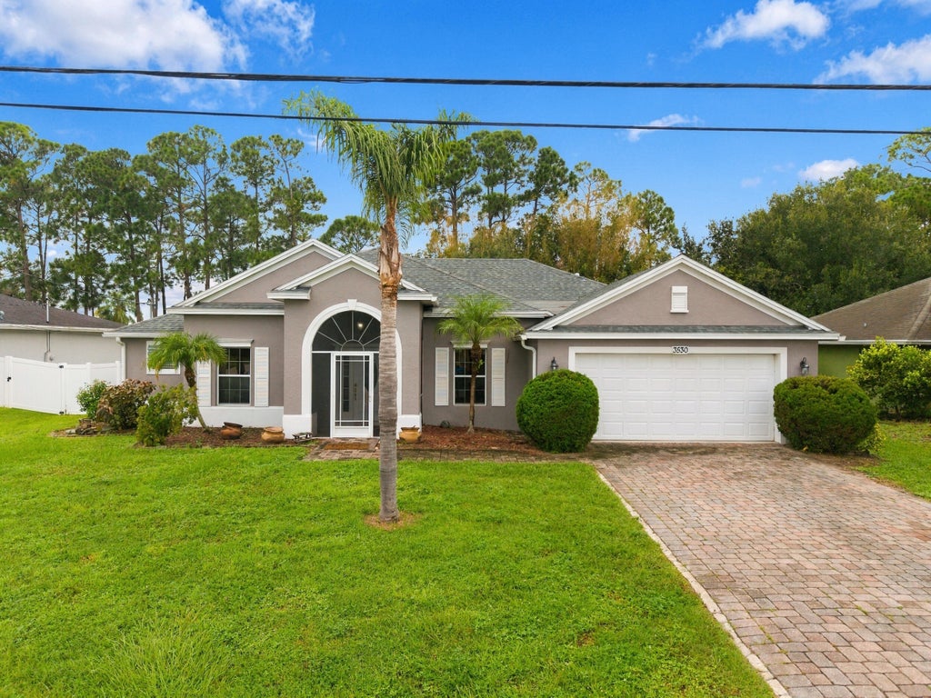 Photo of 3530 SW CONIBEAR Street, Port Saint Lucie, FL 34953 (MLS # B26078099)