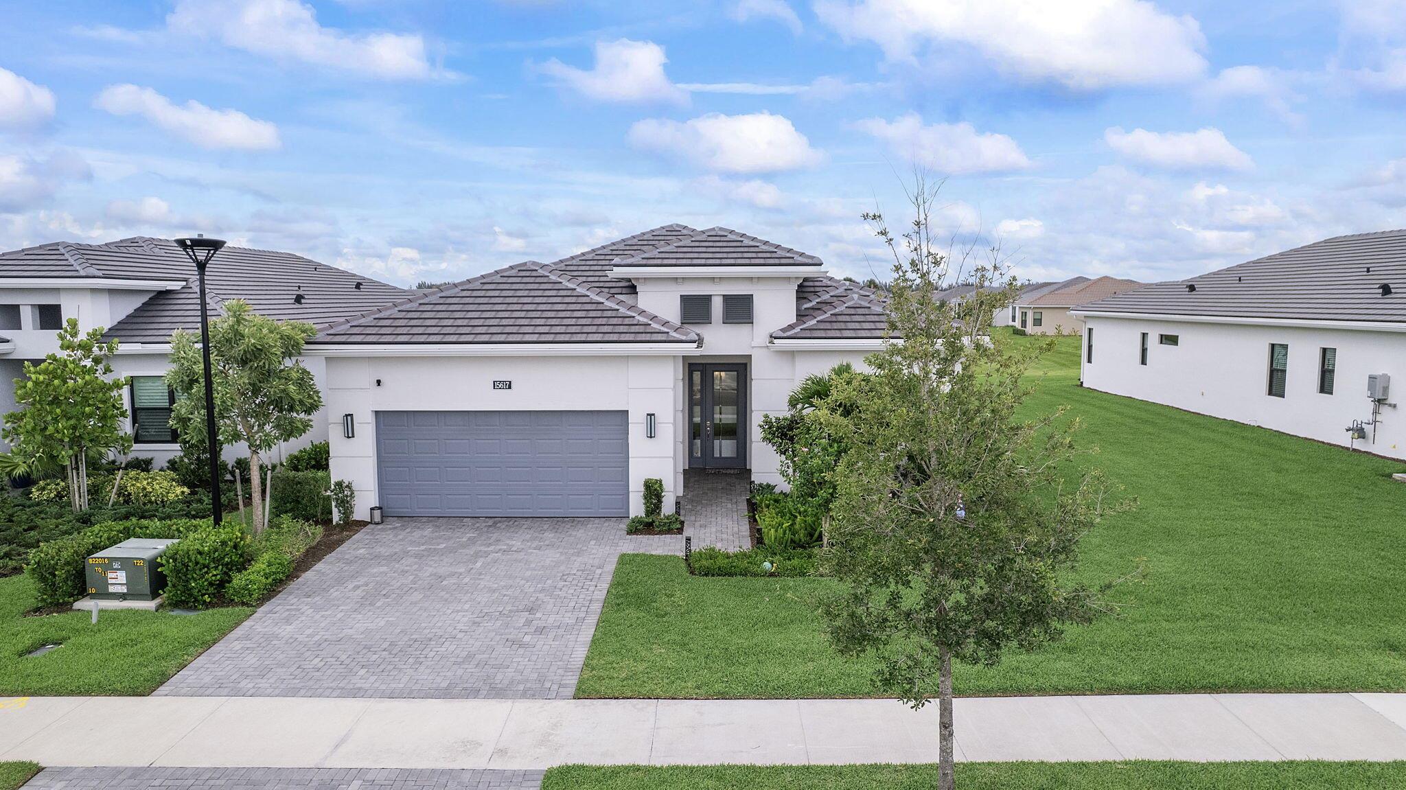 Exquisite Upgraded Home in Cresswind at Westlake!Welcome to luxury living in the sought-after 55+ community of Cresswind at Westlake! This stunning 3-bedroom, 3-bath residence with an oversized den offers the perfect blend of modern comfort, style and functionality. Nestled on a stunning piece of lakefront property, with a fenced-in yard and boasting over $150,000 in premium upgrades, every detail has been thoughtfully curated for today's discerning buyer.Step inside to discover a spacious open-concept layout with high-end finishes throughout, including designer flooring, custom lighting, upgraded cabinetry, and a gourmet chef's kitchen with natural gas range featuring top-of-the-line stainless steel appliances, quartz countertops, and an oversized island perfect for entertaining.