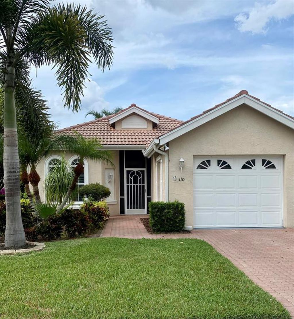Photo of 510 SW Treasure Cove, Port Saint Lucie, FL 34986 (MLS # R10716381)