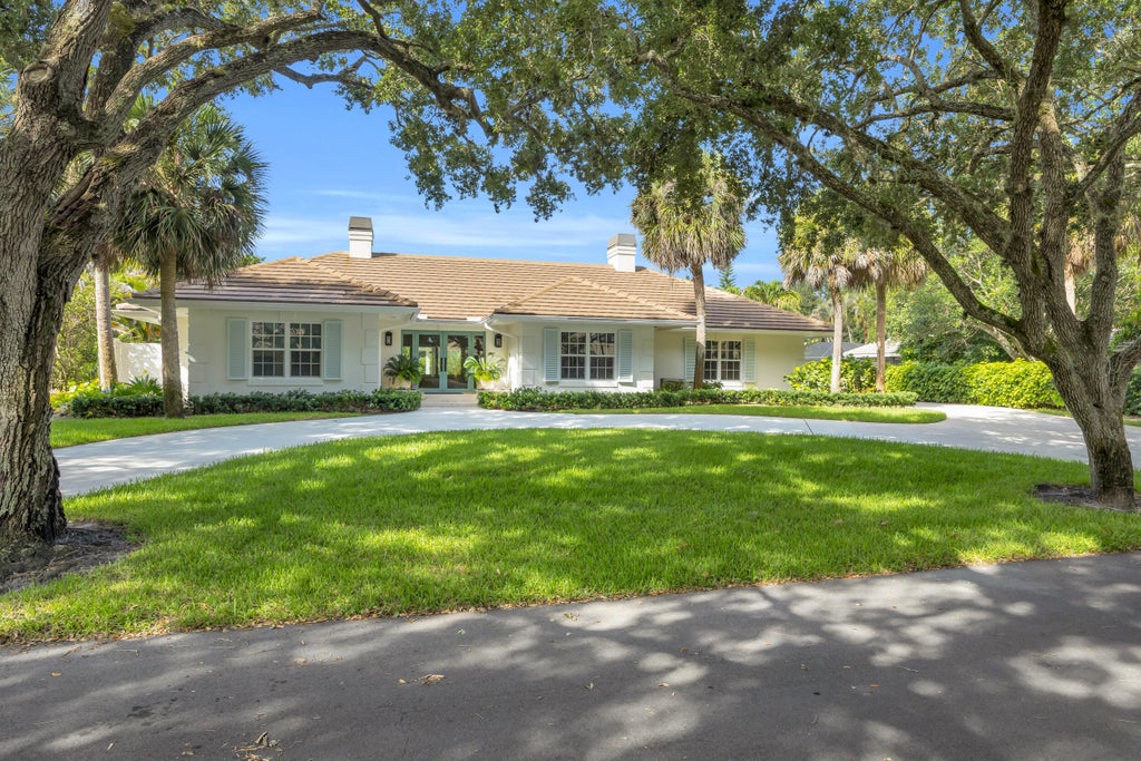 Photo of 10410 SE Banyan Way, Tequesta, FL 33469 (MLS # B26056941)