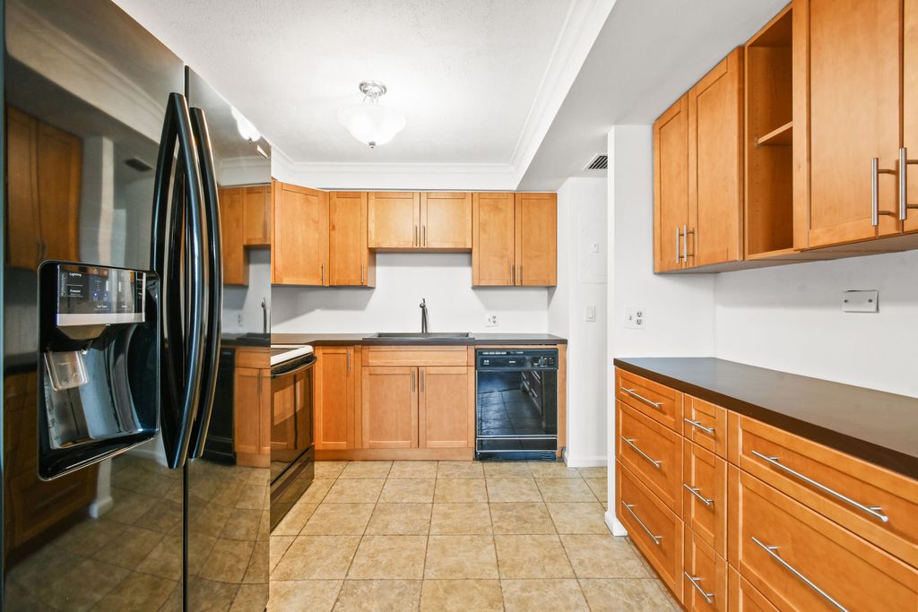 Photo of 3111 Gardens East Drive #23, Palm Beach Gardens, FL 33410 (MLS # R10978920)