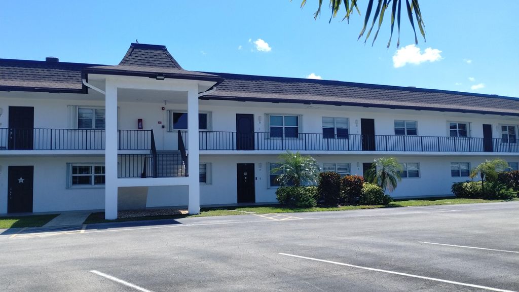 Photo of 3111 Gardens East Drive #23, Palm Beach Gardens, FL 33410 (MLS # R10978920)