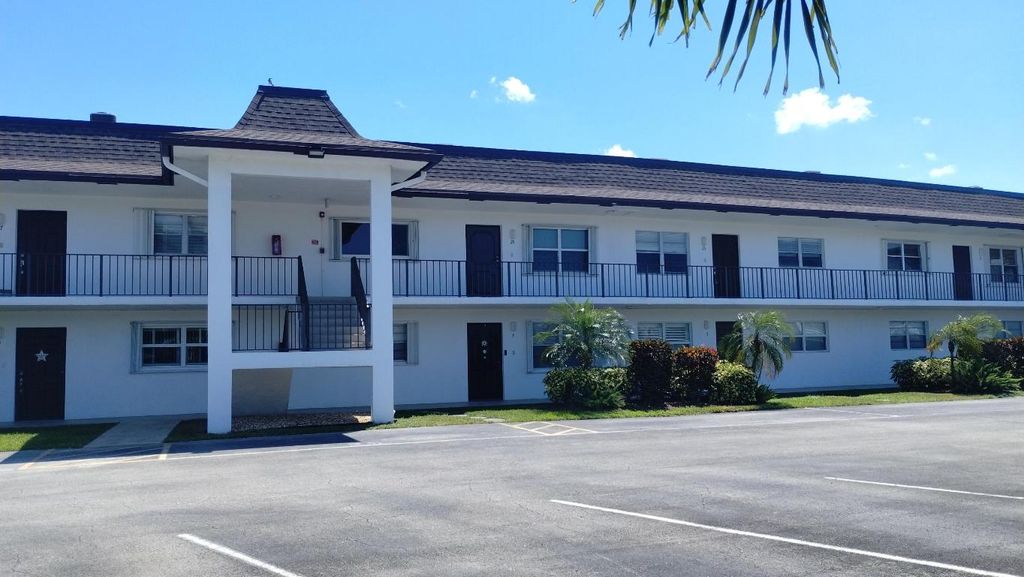 Photo of 3111 Gardens East Drive #23, Palm Beach Gardens, FL 33410 (MLS # R10978920)