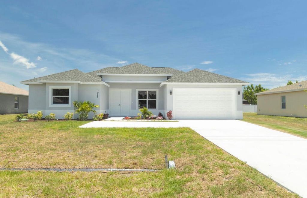 Photo of 1221 SW Alcantarra Boulevard, Port Saint Lucie, FL 34953 (MLS # B26031331)