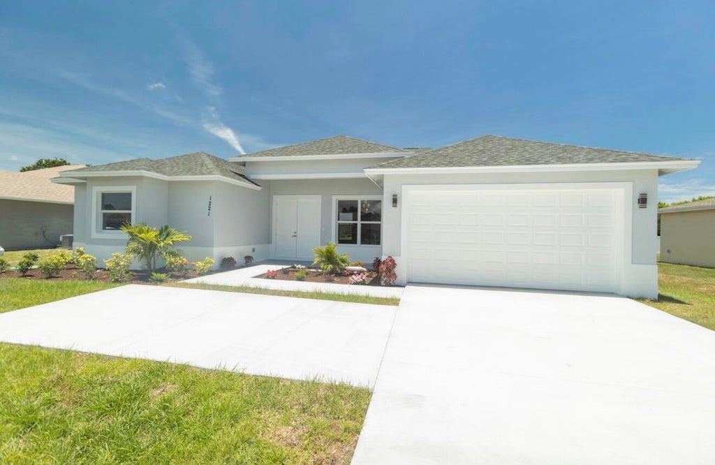 Photo of 1221 SW Alcantarra Boulevard, Port Saint Lucie, FL 34953 (MLS # B26031331)