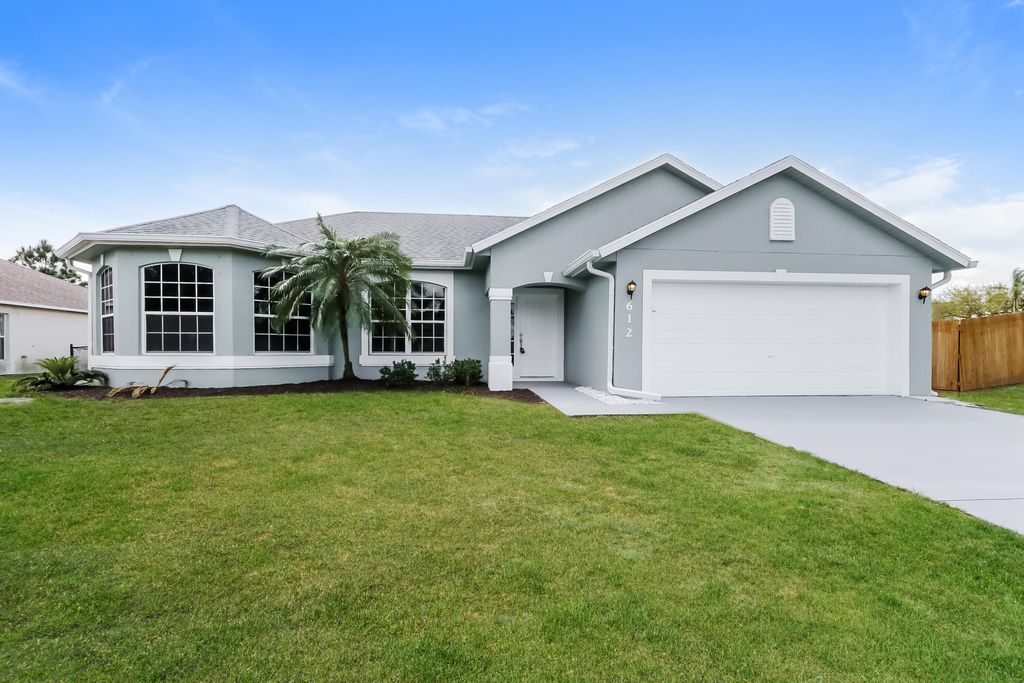 Photo of 612 SW Mccoy Avenue, Port Saint Lucie, FL 34953 (MLS # B26016349)