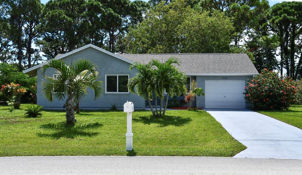 Photo of 2332 SE Grand Drive, Port Saint Lucie, FL 34952 (MLS # R11023715)