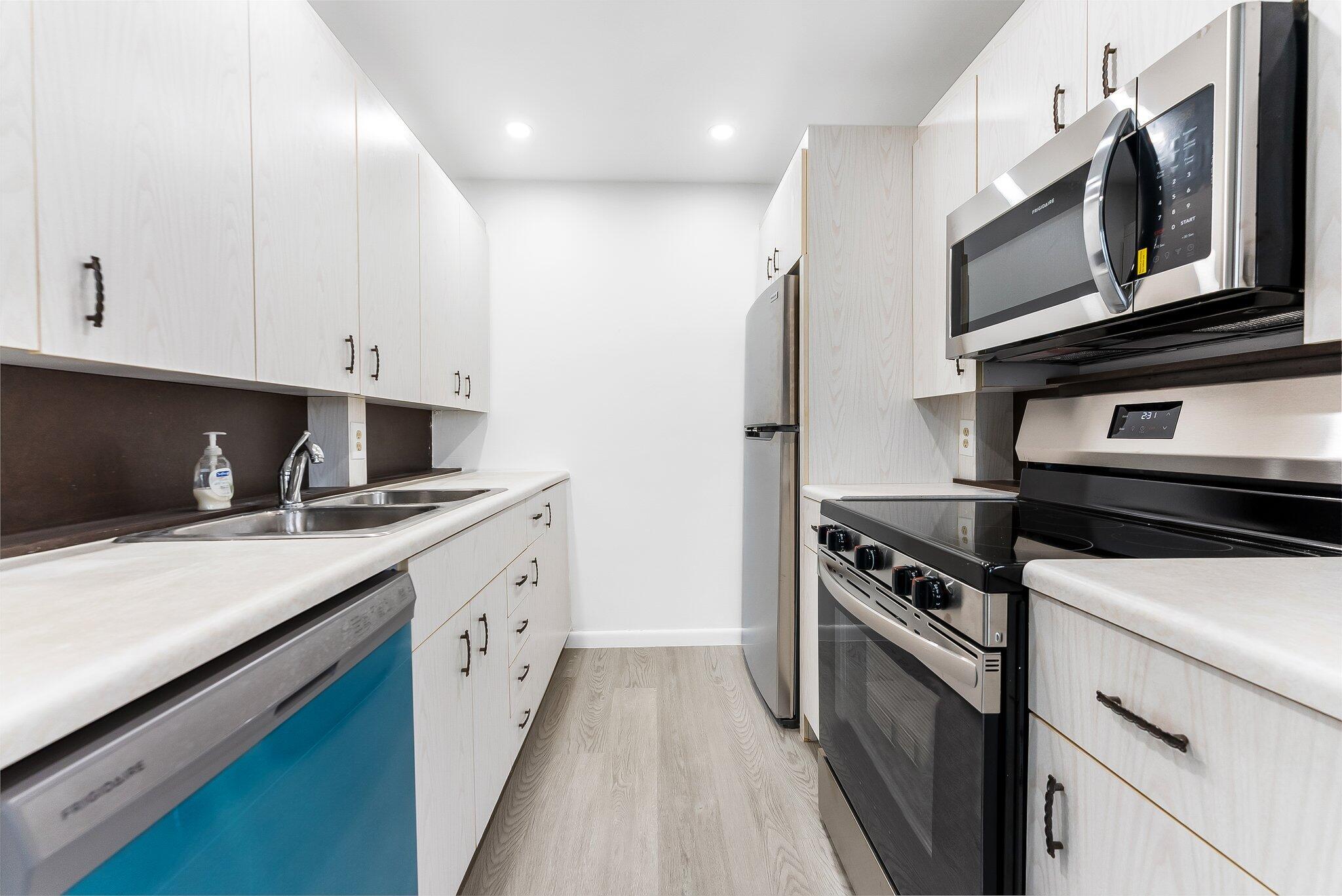 Charming 2-bed, 1.5-bath unit on the 4th floor of a vibrant 55+ community (one resident must be 55+ years old. Elevator available). Available for annual rent. Enjoy panoramic water views from your Florida room/balcony. Features an updated kitchen with new stainless steel appliances, laminate flooring, and a custom walk-in closet. Rent includes premium cable, high-speed internet, water, community shuttle/bus service, and amenities access. Century Village offers a secure, gated environment with a 125,000 sq. ft. clubhouse, gym, pools, theater, and more. HOA approval takes 30 days.