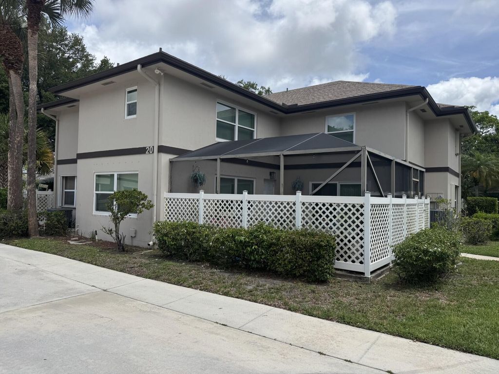Photo of 20 Bedford Court #C, Royal Palm Beach, FL 33411 (MLS # B26025015)