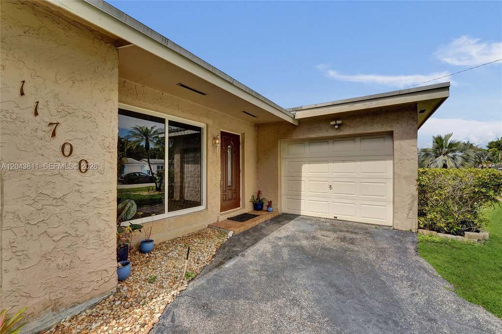 Photo of 11700 NW 33rd Street, Sunrise, FL 33323 (MLS # A12043811)