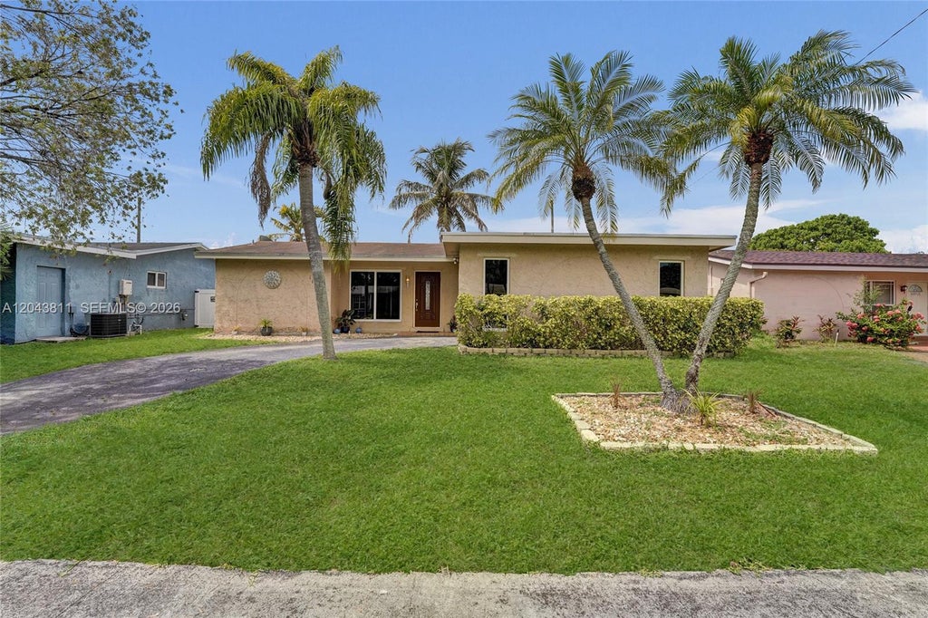 Photo of 11700 NW 33rd Street, Sunrise, FL 33323 (MLS # A12043811)
