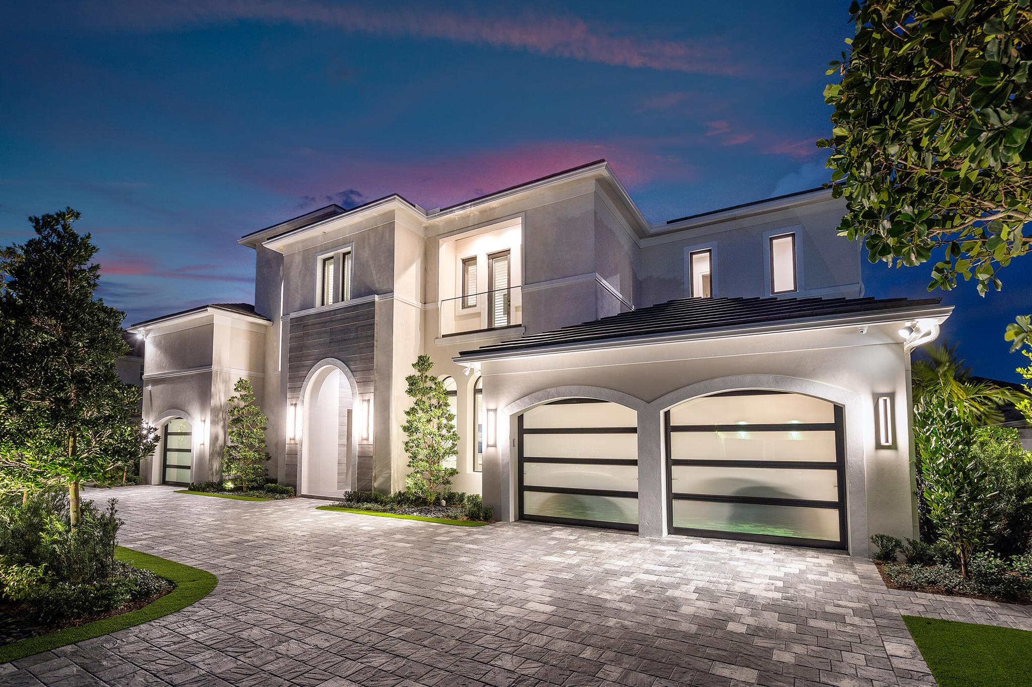 Experience luxurious living in this custom-built residence by Estate Development boasting award winning interior design firm P&H Interiors. This sprawling estate underwent an extensive renovation, reimagining every detail from the interior and exterior to the outdoor landscaping and grounds. This estate features 8 bedrooms, 9 full bathrooms, 3 half baths, a gourmet chef's kitchen, home theatre, office, loft, impact windows and doors, a circular driveway and 3 car garage. As you enter through the grand double-door entry into the foyer with 23 foot high ceilings you will be captivated by the exquisite design and architectural details of this one of a kind property. A floating glass and wood staircase, a barrel ceiling in the dining room, porcelain and wood floors, and