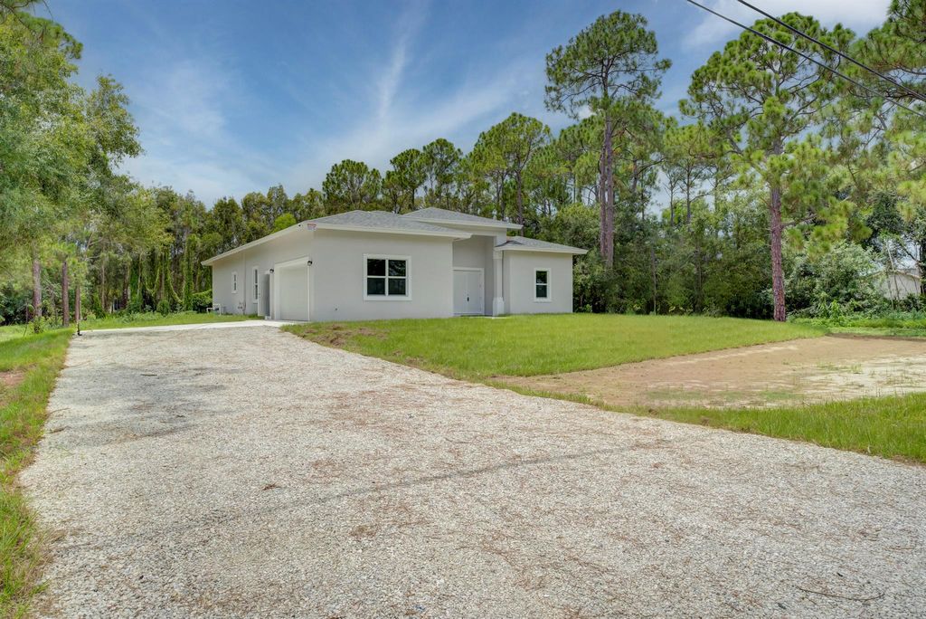 Photo of 18566 50th Street N, Loxahatchee, FL 33470 (MLS # R10910737)