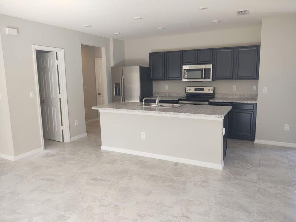 Photo of 3343 Madison Square Lane, Fort Pierce, FL 34982 (MLS # R10952852)