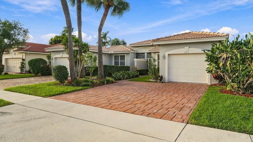 Photo of 5815 Island Reach Lane, Boynton Beach, FL 33437 (MLS # B26092633)