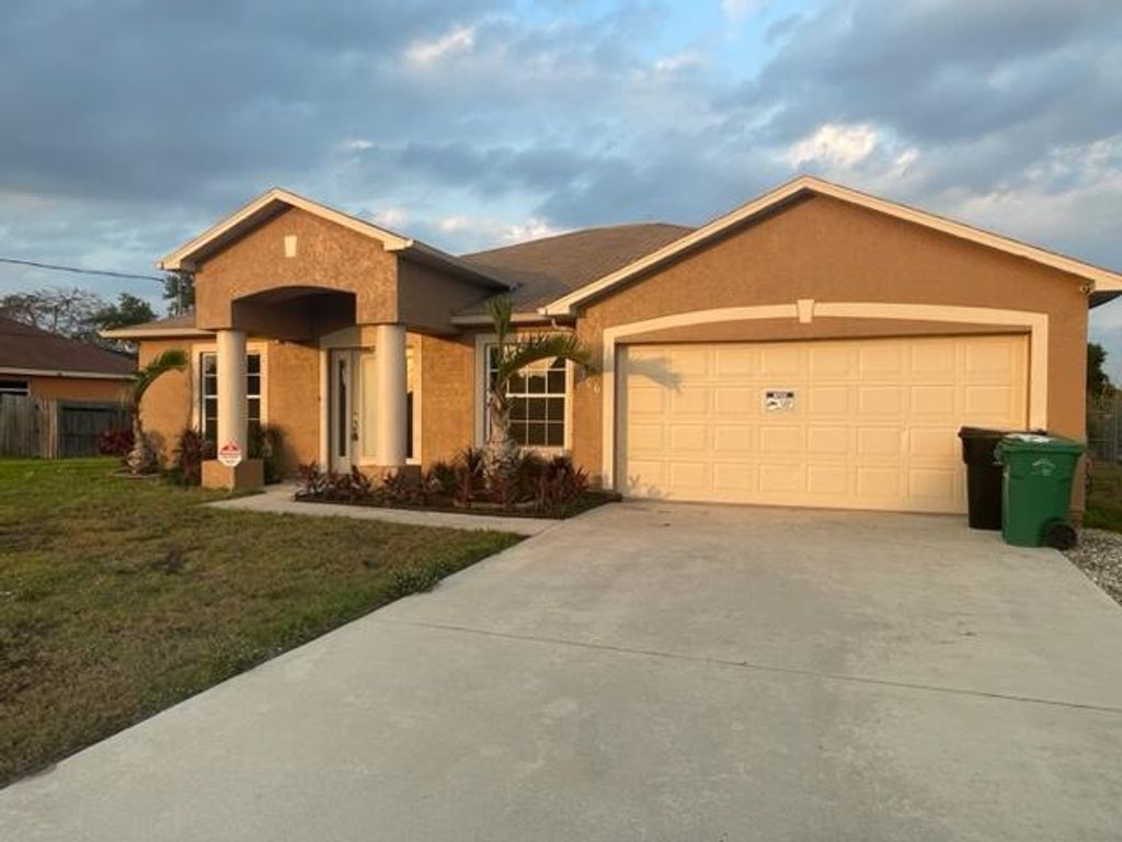 Photo of 306 SW Ridgecrest Drive, Port St Lucie, FL 34953 (MLS # R10880959)