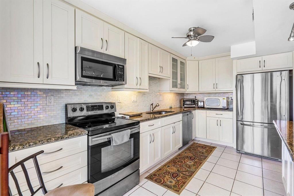 Photo of 5380 Woodland Lakes Drive #217, Palm Beach Gardens, FL 33418 (MLS # R10859772)